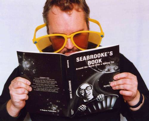 Myles studying the Seabrooke book